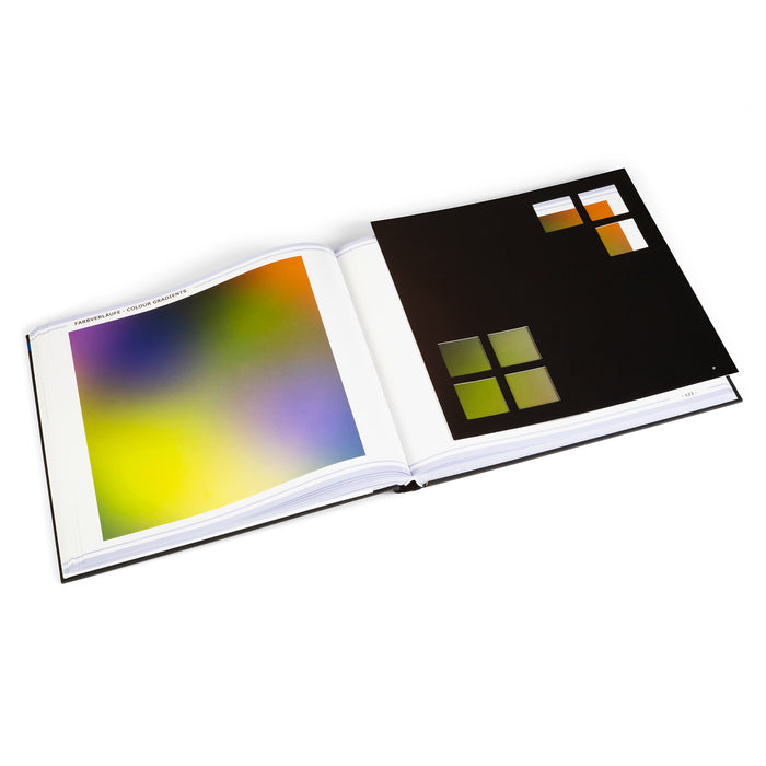 The RAL Colour Master: The Interactive Designbook for Creatives hardback book by Axel Venn and Alexander Venn. This page shows colour gradients on paper being viewed through colour templates.