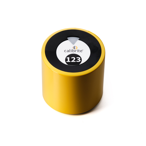 An image showing the Calibrite Display 123 which is a yellow, cylindrical device for calibrating the colour on your monitor.