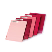 A selection of RAL P2 polypropylene plastic chip samples, in various complimentary pink and red shades. Colours shown include RAL 010 80 20-P. RAL 010 30 44-P, RAL 010 60 45-P, RAL 010 40 53-P and RAL 010 40 53-P-T.