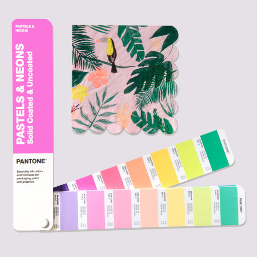 A PANTONE Pastels & Neons Solid Coated & Uncoated colour guide fanned out with colours matching an illustrated napkin design.