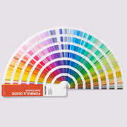 Fanned out PANTONE Formula Guide fan showing colour patches and ink mixing formulations for matching and sharing colours with your design team.